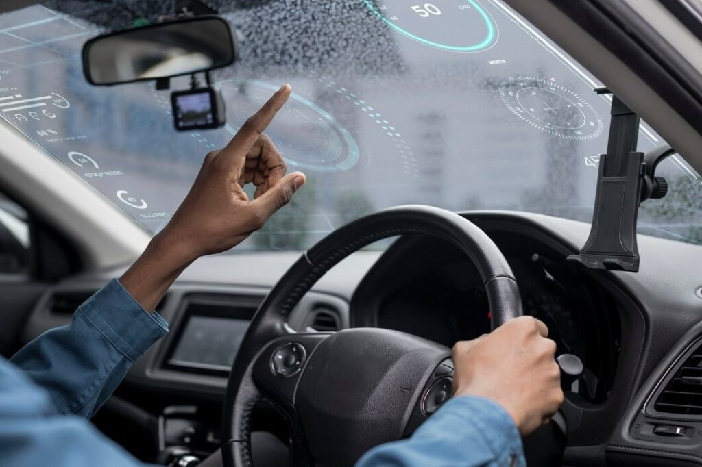 interactive-transparent-window-screen-smart-car_53876-105390.jpg Inovasi dan Teknologi dalam Sistem Mesin Mobil
